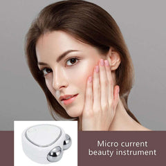 GlowTouch - Mini Facial Massager: Pamper Your Skin!